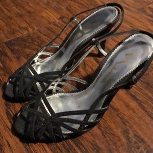 Mia shimmery black fabric open toe slingback.
